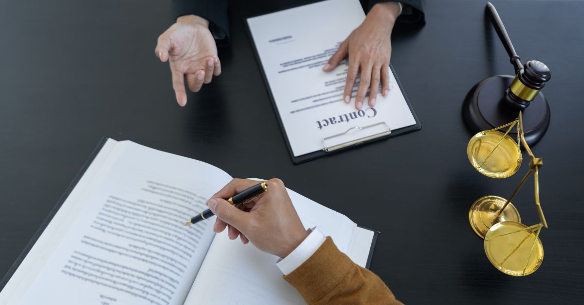 Two attorneys viewing legal documents